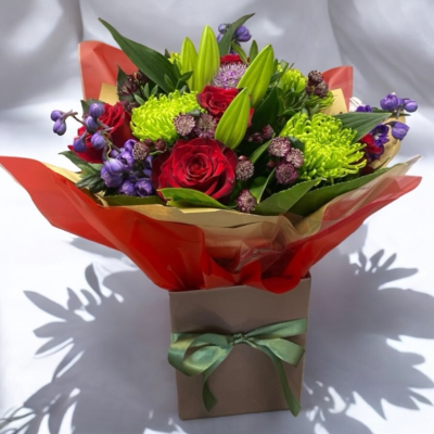 Emerald Kiss - Gift wrapped in a hand-tied and presented in a box which contains water. Hand delivered by us, make them smile with this bright collection of flowers. perfect for any occasion. can be transferred to a vase if preferred.